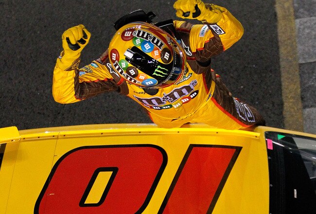 DAYTONA BEACH, FL - FEBRUARY 18:  Kyle Busch, driver of the #18 M&M's Brown Toyota, celebrates after winning the NASCAR Budweiser Shootout at Daytona International Speedway on February 18, 2012 in Daytona Beach, Florida.  (Photo by Todd Warshaw/Getty Images for NASCAR)