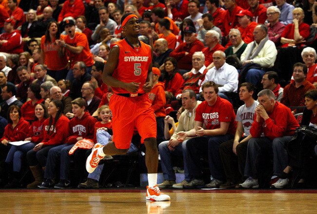 NEW BRUNSWICK, NJ - FEBRUARY 19:  C.J. Fair #5 of the Syracuse Orange reacts after he made a basket in the second half against the Rutgers Scarlet Knights at Louis Brown Athletic Center on February 19, 2012 in New Brunswick, New Jersey.  (Photo by Chris Chambers/Getty Images)