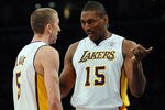 LOS ANGELES, CA - DECEMBER 25:  (L-R)Steve Blake #5 talks with teammate Metta World Peace #15 of the Los Angeles Lakers during the game against the Chicago Bulls at Staples Center on December 25, 2011 in Los Angeles, California.  NOTE TO USER: User expressly acknowledges and agrees that, by downloading and or using this photograph, User is consenting to the terms and conditions of the Getty Images License Agreement.  (Photo by Lisa Blumenfeld/Getty Images)