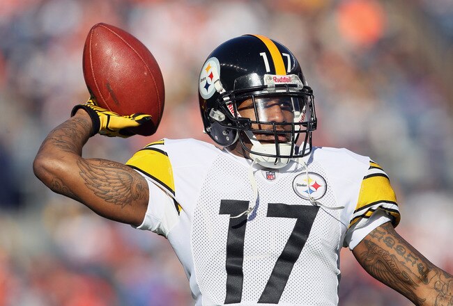 DENVER, CO - JANUARY 08:  Mike Wallace #17 of the Pittsburgh Steelers throws the ball prior to the start of the AFC Wild Card Playoff game against the Denver Broncos at Sports Authority Field at Mile High on January 8, 2012 in Denver, Colorado.  (Photo by Jeff Gross/Getty Images)