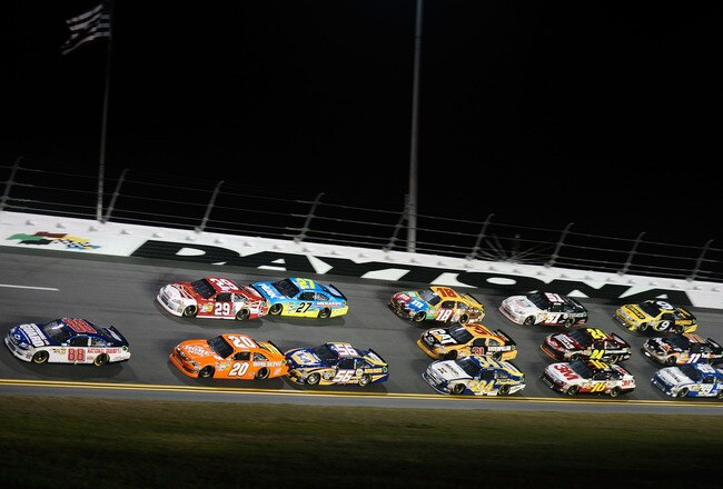 DAYTONA BEACH, FL - FEBRUARY 18:  Dale Earnhardt Jr., driver of the #88 Diet Mountain Dew/National Guard Chevrolet, leads a group of cars during the NASCAR Budweiser Shootout at Daytona International Speedway on February 18, 2012 in Daytona Beach, Florida.  (Photo by Jared C. Tilton/Getty Images for NASCAR)