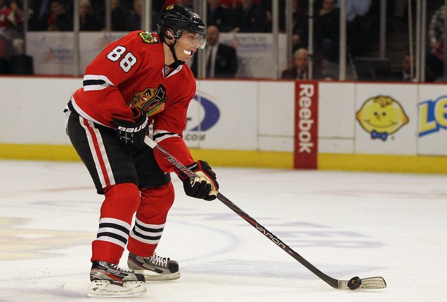 CHICAGO, IL - JANUARY 18:  Patrick Kane #88 of the Chicago Blackhawks controls the puck against the Buffalo Sabres at the United Center on January 18, 2012 in Chicago, Illinois. The Blackhawks defeated the Sabres 6-2.  (Photo by Jonathan Daniel/Getty Images)