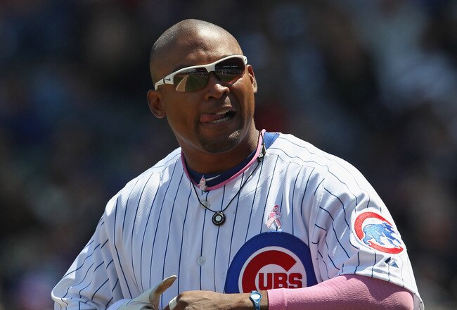 CHICAGO, IL - MAY 08: Marlon Byrd #24 of the Chicago Cubs walks to the outfield against the Cincinnati Reds at Wrigley Field on May 8, 2011 in Chicago, Illinois. The Reds defeated the Cubs 2-0.  (Photo by Jonathan Daniel/Getty Images)