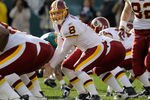 PHILADELPHIA, PA - JANUARY 01: Quarterback Rex Grossman #8 of the Washington Redskins calls a signal under center against the Philadelphia Eagles  at Lincoln Financial Field on January 1, 2012 in Philadelphia, Pennsylvania.  (Photo by Rob Carr/Getty Images)