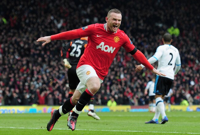 MANCHESTER, ENGLAND - FEBRUARY 11:  Wayne Rooney of Manchester United celebrates scoring his second goal during the Barclays Premier League match between Manchester United and Liverpool at Old Trafford on February 11, 2012 in Manchester, England.  (Photo by Shaun Botterill/Getty Images)