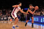 NEW YORK, NY - FEBRUARY 17: Marco Belinelli #8 of the New Orleans Hornets is guarded by Landry Fields #2 of the New York Knicks at Madison Square Garden on February 17, 2012 in New York City. NOTE TO USER: User expressly acknowledges and agrees that, by downloading and/or using this Photograph, user is consenting to the terms and conditions of the Getty Images License Agreement.  (Photo by Chris Trotman/Getty Images)