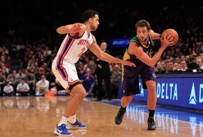 NEW YORK, NY - FEBRUARY 17: Marco Belinelli #8 of the New Orleans Hornets is guarded by Landry Fields #2 of the New York Knicks at Madison Square Garden on February 17, 2012 in New York City. NOTE TO USER: User expressly acknowledges and agrees that, by downloading and/or using this Photograph, user is consenting to the terms and conditions of the Getty Images License Agreement.  (Photo by Chris Trotman/Getty Images)