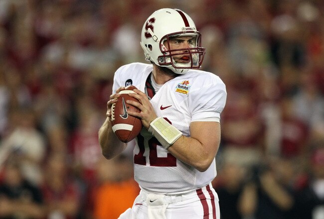 GLENDALE, AZ - JANUARY 02:  Andrew Luck #12 of the Stanford Cardinal looks to pass against the Oklahoma State Cowboys during the Tostitos Fiesta Bowl on January 2, 2012 at University of Phoenix Stadium in Glendale, Arizona.  (Photo by Donald Miralle/Getty Images)