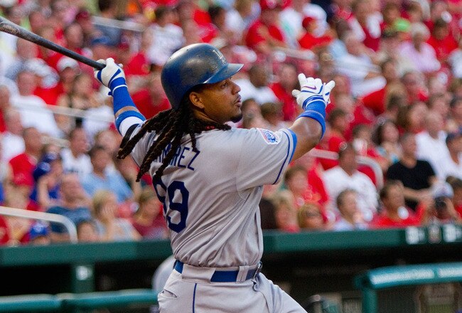 ST. LOUIS - JULY 15:  Manny Ramierez #99 of the Los Angeles Dodgers bats against the St. Louis Cardinals at Busch Stadium on July 15, 2010 in St. Louis, Missouri.  (Photo by Dilip Vishwanat/Getty Images)