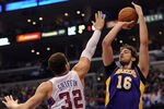 LOS ANGELES, CA - JANUARY 14:  Pau Gasol #16 of the Los Angeles Lakers takes shoots a jumper in front of Blake Griffin #32 of the Los Angeles Clippers at Staples Center on January 14, 2012 in Los Angeles, California.  NOTE TO USER: User expressly acknowledges and agrees that, by downloading and/or using this Photograph, user is consenting to the terms and conditions of the Getty Images License Agreement.  (Photo by Harry How/Getty Images)