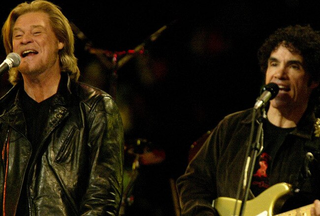 9 Feb 2002: Daryl Hall and John Oates play one of their songs during the Saturday night session  of the NBA All-Star Weekend at the First Union Center in Philadelphia, Pennsylvania. Digital Image NOTE TO USER: User expressly acknowledges and agrees that, by downloading and/or using this Photograph, User is consenting to the terms and conditions of the Getty Images License Agreement.  Mandatory copyright notice: Copyright 2001 NBAE Mandatory Credit: Andy Lyons/Getty Images/NBAE