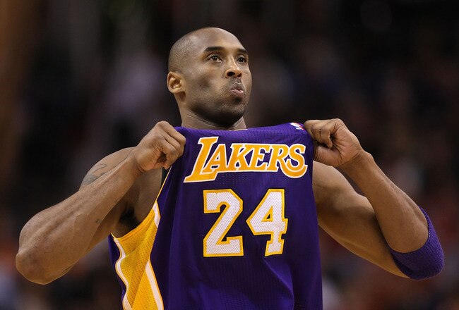 PHOENIX, AZ - FEBRUARY 19:  Kobe Bryant #24 of the Los Angeles Lakers adjusts his jersey during the NBA game against the Phoenix Suns at US Airways Center on February 19, 2012 in Phoenix, Arizona. The Suns defeated the Lakers 102-90. NOTE TO USER: User expressly acknowledges and agrees that, by downloading and or using this photograph, User is consenting to the terms and conditions of the Getty Images License Agreement.  (Photo by Christian Petersen/Getty Images)