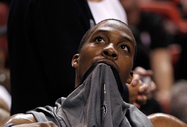 MIAMI, FL - FEBRUARY 19: Dwight Howard #12 of the Orlando Magic looks on during a game against the Miami Heat at American Airlines Arena on February 19, 2012 in Miami, Florida. NOTE TO USER: User expressly acknowledges and agrees that, by downloading and/or using this Photograph, User is consenting to the terms and conditions of the Getty Images License Agreement.  (Photo by Mike Ehrmann/Getty Images)