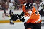PHILADELPHIA, PA - FEBRUARY 18: Nicklas Grossman #8 of the Philadelphia Flyers takes a shot in warmups prior to playing in his first game as a Flyer against the Pittsburgh Penguins at the Wells Fargo Center on February 18, 2012 in Philadelphia, Pennsylvania.  (Photo by Bruce Bennett/Getty Images)