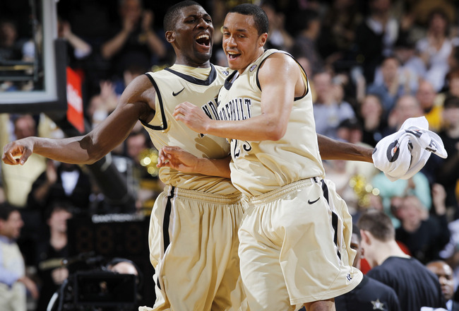 NASHVILLE, TN - FEBRUARY 11: John Jenkins #23 and Festus Ezeli #3 of the Vanderbilt Commodores celebrate during the game against the Kentucky Wildcats at Memorial Gymnasium on February 11, 2012 in Nashville, Tennessee. Kentucky won 69-63. (Photo by Joe Robbins/Getty Images)