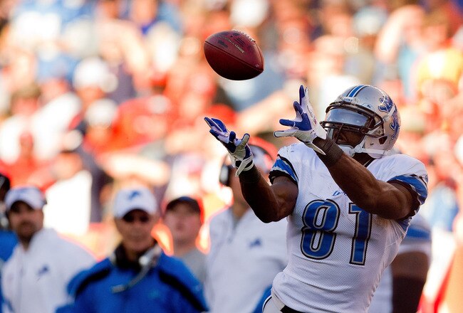 DENVER, CO - OCTOBER 30:  Wide receiver Calvin Johnson #81 of the Detroit Lions makes a reception on his way to scoring a 56-yard touchdown during the third quarter against the Denver Broncos at Sports Authority Field at Mile High on October 30, 2011 in Denver, Colorado. The Lions defeated the Broncos 45-10. (Photo by Justin Edmonds/Getty Images)