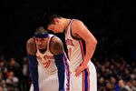 NEW YORK, NY - FEBRUARY 20: Carmelo Anthony #7 and Jeremy Lin #17 of the New York Knicks stand on the court against the New Jersey Nets at Madison Square Garden on February 20, 2012 in New York City. NOTE TO USER: User expressly acknowledges and agrees that, by downloading and/or using this Photograph, user is consenting to the terms and conditions of the Getty Images License Agreement.  (Photo by Chris Trotman/Getty Images)
