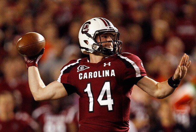 COLUMBIA, SC - NOVEMBER 26:  Connor Shaw #14 of the South Carolina Gamecocks drops back to pass against the Clemson Tigers during their game at Williams-Brice Stadium on November 26, 2011 in Columbia, South Carolina.  (Photo by Streeter Lecka/Getty Images)