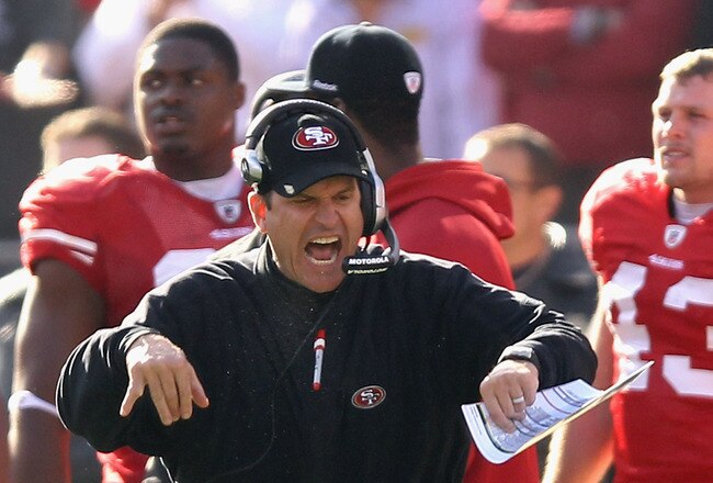SAN FRANCISCO, CA - JANUARY 14:  Head coach Jim Harbaugh of the San Francisco 49ers reacts on the sidelines during the NFC Divisional playoff game against the New Orleans Saints at Candlestick Park on January 14, 2012 in San Francisco, California.  (Photo by Ezra Shaw/Getty Images)