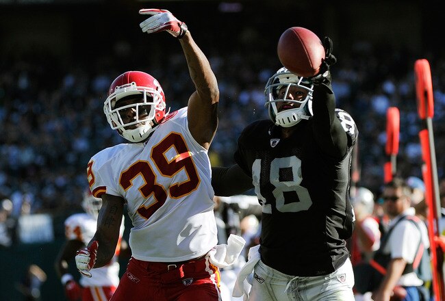 OAKLAND, CA - OCTOBER 23:  Louis Murphy #18 of the Oakland Raiders can't catch up to this pass thrown by Carson Palmer #3 over Brandon Carr #39 of the Kansas City Chiefs at O.co Coliseum on October 23, 2011 in Oakland, California.  (Photo by Thearon W. Henderson/Getty Images)