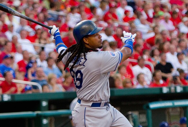 ST. LOUIS - JULY 15:  Manny Ramierez #99 of the Los Angeles Dodgers bats against the St. Louis Cardinals at Busch Stadium on July 15, 2010 in St. Louis, Missouri.  (Photo by Dilip Vishwanat/Getty Images)