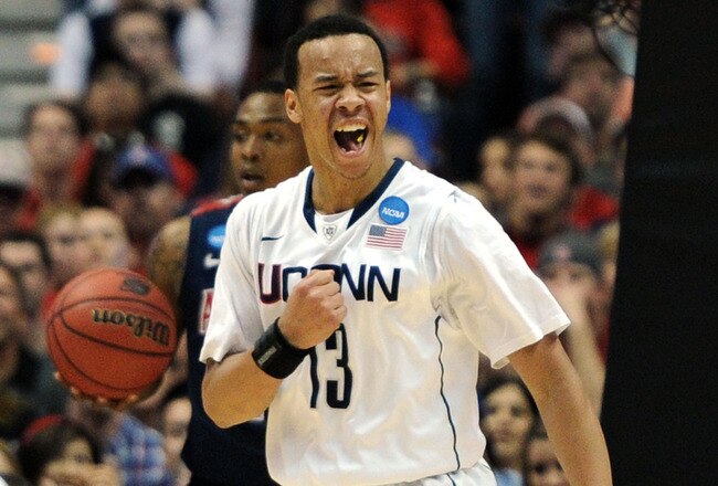 ANAHEIM, CA - MARCH 26:  Shabazz Napier #13 of the Connecticut Huskies reacts after a basket against the Connecticut Huskies during the west regional final of the 2011 NCAA men's basketball tournament at the Honda Center on March 26, 2011 in Anaheim, California.  (Photo by Harry How/Getty Images)