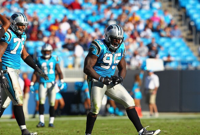 CHARLOTTE, NC - OCTOBER 23: Charles Johnson #95 of the Carolina Panthers celebrates a sack against the Washington Redskins at the Bank of America Stadium on October 23, 2011 in Charlotte, North Carolina.  (Photo by Dilip Vishwanat/Getty Images)