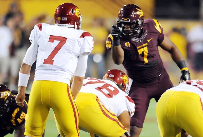 TEMPE, AZ - SEPTEMBER 24:   Vontaze Burfict #7 of the Arizona State Sun Devils points and yells at quarterback Matt Barkley #7 of the University of Southern California Trojans just prior to a play at Sun Devil Stadium on September 24, 2011 in Tempe, Arizona.  (Photo by Norm Hall/Getty Images)
