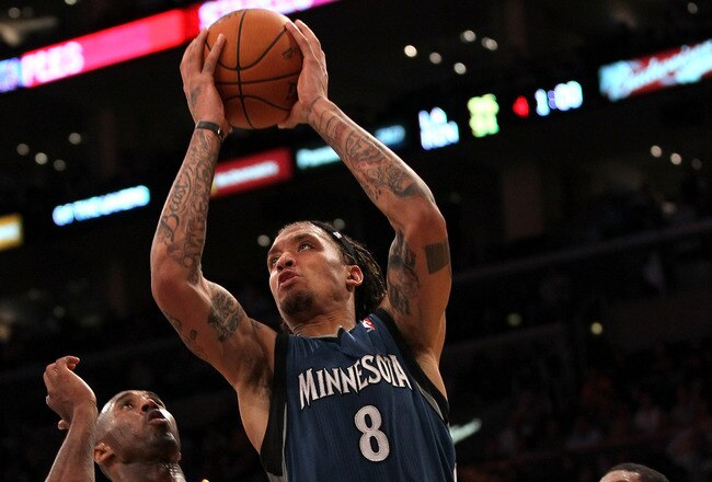 LOS ANGELES, CA - NOVEMBER 09:  Michael Beasley #8 of the Minnesota Timberwolves goes up for a shot over Kobe Bryant #24 of the Los Angeles Lakers at Staples Center on November 9, 2010 in Los Angeles, California. The Lakers won 99-94.   NOTE TO USER: User expressly acknowledges and agrees that, by downloading and or using this photograph, User is consenting to the terms and conditions of the Getty Images License Agreement.  (Photo by Stephen Dunn/Getty Images)