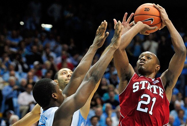 CHAPEL HILL, NC - JANUARY 26:  C.J. Williams #21 of the North Carolina State Wolfpack shoots against the North Carolina Tar Heels during play at the Dean Smith Center on January 26, 2012 in Chapel Hill, North Carolina. North Carolina won 74-55.  (Photo by Grant Halverson/Getty Images)