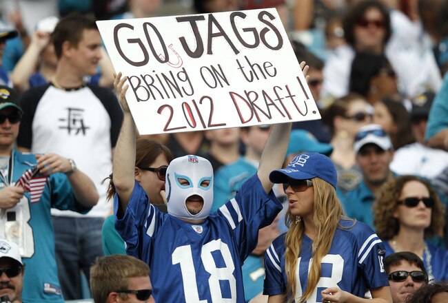 JACKSONVILLE, FL - JANUARY 1: Indianapolis Colts fans look on during the game against the Jacksonville Jaguars at EverBank Field on January 1, 2012 in Jacksonville, Florida. The Jaguars defeated the Colts 19-13 as Indianapolis secured the first pick in the 2012 draft. (Photo by Joe Robbins/Getty Images)