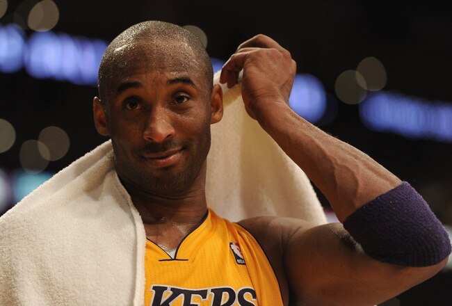 LOS ANGELES, CA - FEBRUARY 20:  Kobe Bryant #24 of the Los Angeles Lakers reacts after a 103-92 win over the Portland Trail Blazers at Staples Center on February 20, 2012 in Los Angeles, California.  NOTE TO USER: User expressly acknowledges and agrees that, by downloading and or using this photograph, User is consenting to the terms and conditions of the Getty Images License Agreement.  (Photo by Harry How/Getty Images)