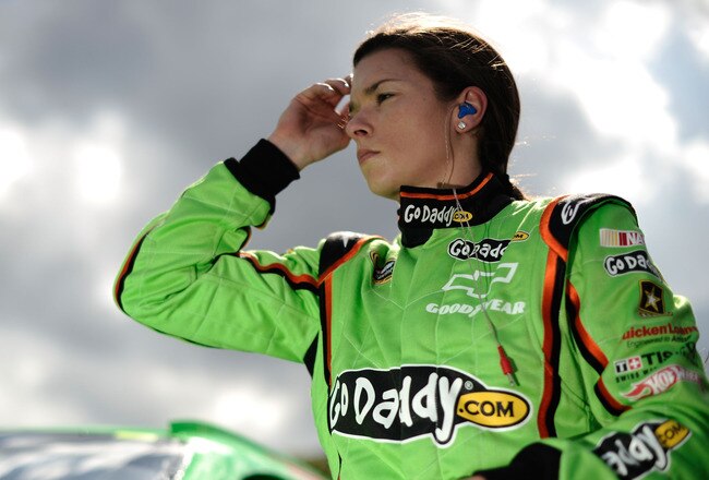 DAYTONA BEACH, FL - FEBRUARY 19:  Danica Patrick, driver of the #10 GoDaddy.com Chevrolet, gets out of her car after qualifying for the NASCAR Sprint Cup Series Daytona 500 at Daytona International Speedway on February 19, 2012 in Daytona Beach, Florida.  (Photo by Jared C. Tilton/Getty Images for NASCAR)