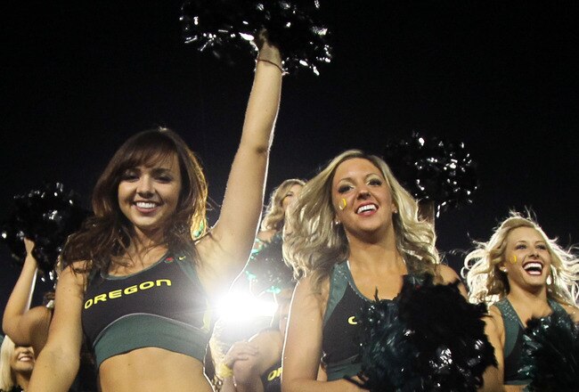 PASADENA, CA - JANUARY 02:  Oregon Ducks cheerleaders celebrate the Ducks 45-38 victory against the Wisconsin Badgers at the 98th Rose Bowl Game on January 2, 2012 in Pasadena, California.  (Photo by Stephen Dunn/Getty Images)