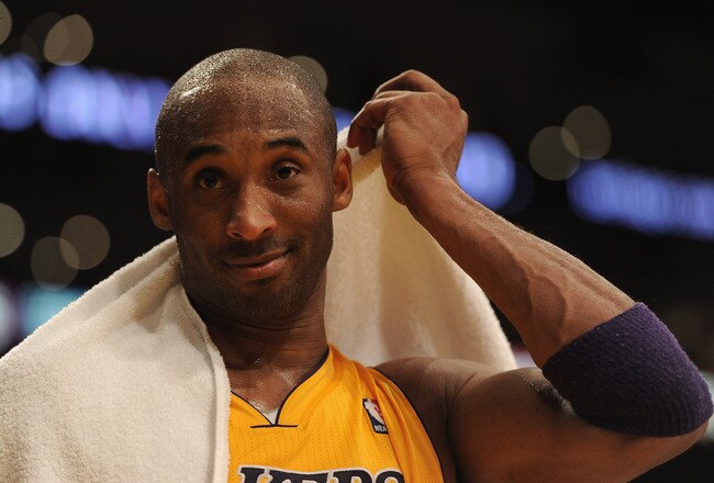 LOS ANGELES, CA - FEBRUARY 20:  Kobe Bryant #24 of the Los Angeles Lakers reacts after a 103-92 win over the Portland Trail Blazers at Staples Center on February 20, 2012 in Los Angeles, California.  NOTE TO USER: User expressly acknowledges and agrees that, by downloading and or using this photograph, User is consenting to the terms and conditions of the Getty Images License Agreement.  (Photo by Harry How/Getty Images)