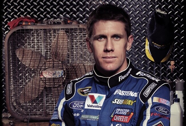 DAYTONA BEACH, FL - FEBRUARY 16:  ***EDITOR NOTE: POST-CAPTURE IMAGE PROCESSING AND ENHANCEMENT*** Carl Edwards, driver of the #99 Fastenal Ford, poses during NASCAR Media Day at Daytona International Speedway on February 16, 2012 in Daytona Beach, Florida.  (Photo by Jamie Squire/Getty Images for NASCAR)