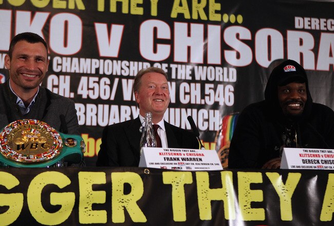 LONDON, ENGLAND - JANUARY 09:  (L-R) Vitali Klitschko of the Ukraine, promoter Frank Warren and Dereck Chisora of England during a press conference at The Landmark Hotel on January 9, 2012 in London, England.  (Photo by Andrew Redington/Getty Images)