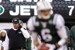EAST RUTHERFORD, NJ - DECEMBER 24:  Head coach Rex Ryan of the New York Jets looks on as quarterback Mark Sanchez #6 drops back to pass during a game at MetLife Stadium on December 24, 2011 in East Rutherford. New Jersey. The Giants won 29 - 14. (Photo by Rich Schultz/Getty Images)