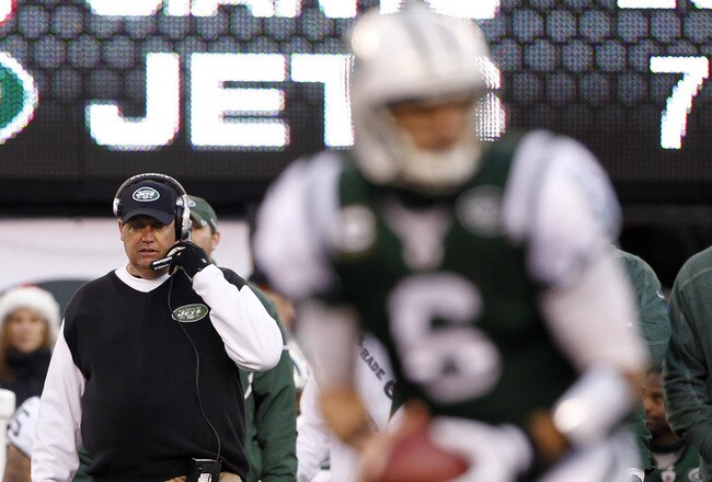 EAST RUTHERFORD, NJ - DECEMBER 24:  Head coach Rex Ryan of the New York Jets looks on as quarterback Mark Sanchez #6 drops back to pass during a game at MetLife Stadium on December 24, 2011 in East Rutherford. New Jersey. The Giants won 29 - 14. (Photo by Rich Schultz/Getty Images)