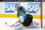 SAN JOSE, CA - FEBRUARY 08:  Goaltenter Antti Niemi #31 of the San Jose Sharks makes a glove-hand save against the Calgary Flames at HP Pavilion at San Jose on February 8, 2012 in San Jose, California.  (Photo by Thearon W. Henderson/Getty Images)