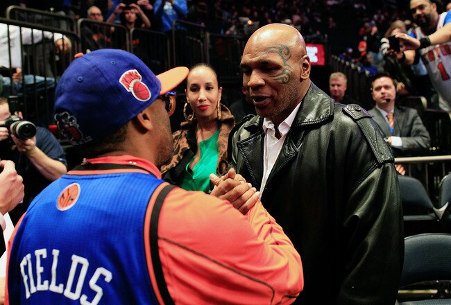 NEW YORK, NY - FEBRUARY 15: (L) Spike lee chats with (R) Mike Tyson before the game between the New York Knicks and the Sacramento Kings at Madison Square Garden on February 15, 2012 in New York City. NOTE TO USER: User expressly acknowledges and agrees that, by downloading and/or using this Photograph, user is consenting to the terms and conditions of the Getty Images License Agreement.  (Photo by Chris Trotman/Getty Images)