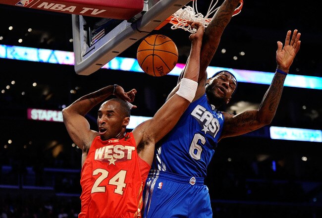 LOS ANGELES, CA - FEBRUARY 20:  Kobe Bryant #24 of the Los Angeles Lakers and the Western Conference dunks in front of LeBron James #6 of the Miami Heat and the Eastern Conference in the second half of the 2011 NBA All-Star Game at Staples Center on February 20, 2011 in Los Angeles, California. NOTE TO USER: User expressly acknowledges and agrees that, by downloading and or using this photograph, User is consenting to the terms and conditions of the Getty Images License Agreement.  (Photo by Kevork Djansezian/Getty Images)