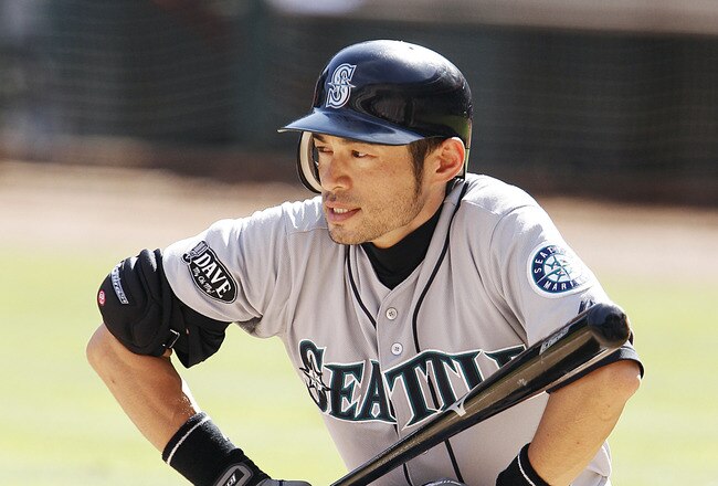 ARLINGTON, TX - SEPTEMBER 24: Ichiro Suzuki #51 of the Seattle Mariners waits to bat against the Texas Rangers during a baseball game at Rangers Ballpark in Arlington on September 24, 2011 in Arlington, Texas. (Photo by Brandon Wade/Getty Images)