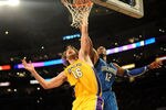 LOS ANGELES, CA - JANUARY 18:  Pau Gasol #16 of the Los Angeles Lakers and Dwight Howard #12 of the Orlando Magic go for the rebound in the fourth quarter during the game on January 18, 2010 at Staples Center in Los Angeles, California. The Lakers won 98-92. NOTE TO USER: User expressly acknowledges and agrees that, by downloading and/or using this Photograph, user is consenting to the terms and conditions of the Getty Images License Agreement.  (Photo by Harry How/Getty Images)