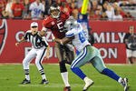 TAMPA, FL - DECEMBER 17:  Linebacker Anthony Spencer #93 of the Dallas Cowboys pressures quarterback Josh Freeman #5 of the Tampa Bay Buccaneers December 17, 2011 at Raymond James Stadium in Tampa, Florida. (Photo by Al Messerschmidt/Getty Images)