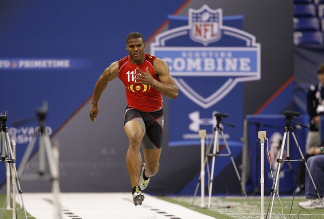INDIANAPOLIS, IN - FEBRUARY 27: Cam Newton runs the 40-yard dash during the 2011 NFL Scouting Combine at Lucas Oil Stadium on February 27, 2011 in Indianapolis, Indiana. (Photo by Joe Robbins/Getty Images)