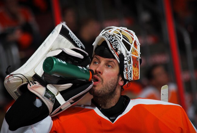 PHILADELPHIA, PA - APRIL 22:  Michael Leighton #49 of the Philadelphia Flyers takes a drink of water in the third period of Game Five of the Eastern Conference Quarterfinals against the Buffalo Sabres during the 2011 NHL Stanley Cup Playoffs at Wells Fargo Center on April 22, 2011 in Philadelphia, Pennsylvania.  (Photo by Bruce Bennett/Getty Images)