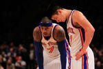 NEW YORK, NY - FEBRUARY 20: Carmelo Anthony #7 and Jeremy Lin #17 of the New York Knicks stand on the court against the New Jersey Nets at Madison Square Garden on February 20, 2012 in New York City. NOTE TO USER: User expressly acknowledges and agrees that, by downloading and/or using this Photograph, user is consenting to the terms and conditions of the Getty Images License Agreement.  (Photo by Chris Trotman/Getty Images)