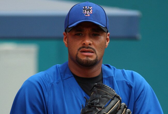 MIAMI GARDENS, FL - JULY 24:  Johan Santana #57 of the New York Mets pitches in the bullpen during a throwing session before a game against the Florida Marlins at Sun Life Stadium on July 24, 2011 in Miami Gardens, Florida.  (Photo by Sarah Glenn/Getty Images)