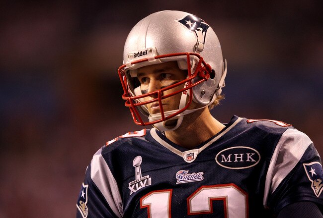 INDIANAPOLIS, IN - FEBRUARY 05:  Quarterback Tom Brady #12 of the New England Patriots reacts after a play against the New York Giants during Super Bowl XLVI at Lucas Oil Stadium on February 5, 2012 in Indianapolis, Indiana.  (Photo by Jamie Squire/Getty Images)
